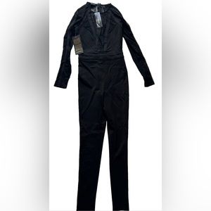 Bebe Women's US 4 Naomi Lace Blocked Jumpsuit Jet Black 15WCD905923-001 NWT